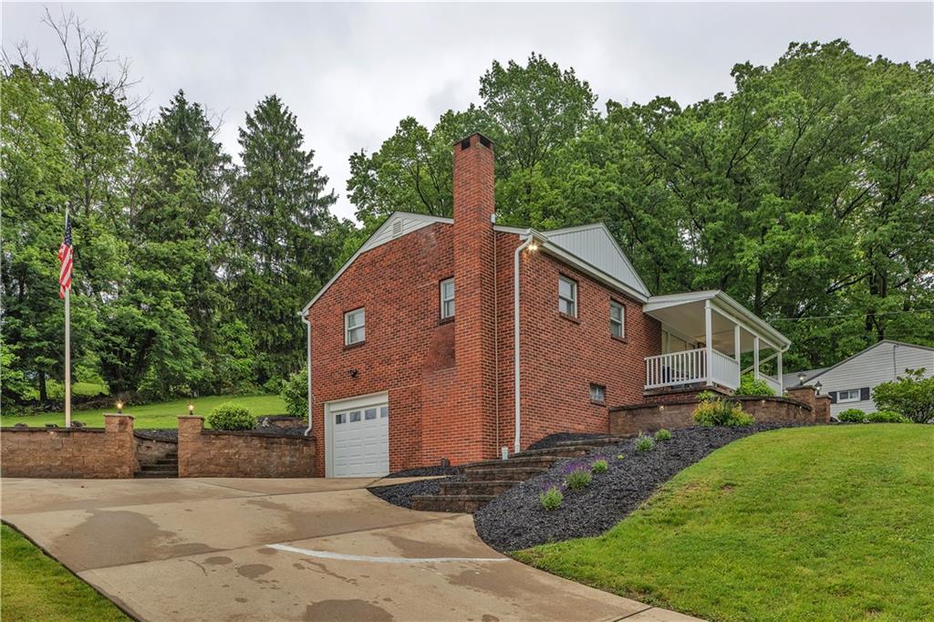 360 Orr Avenue Apollo, PA 15613 - Photo 22 of 24 a front view of a house with garden
