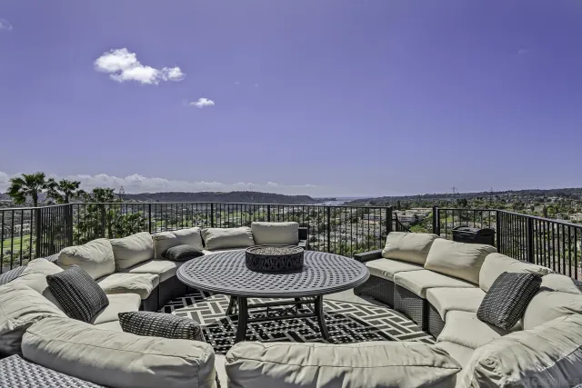 a kitchen with stainless steel appliances granite countertop a sink a stove a refrigerator and cabinets