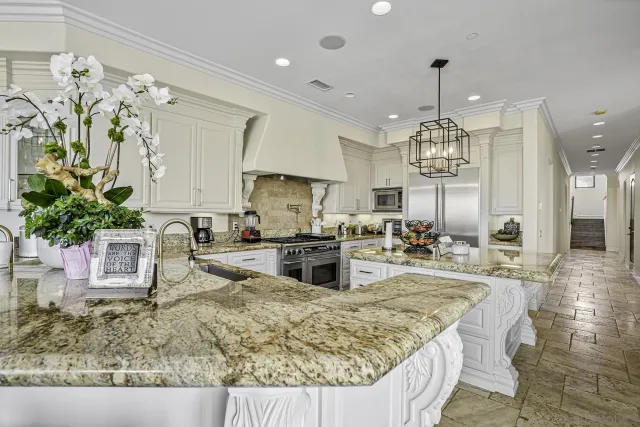 a room with furniture a flat screen tv and windows