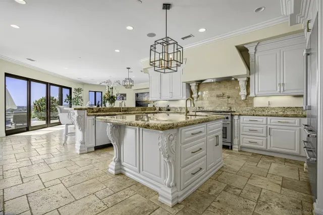 a living room with furniture a rug and a large window
