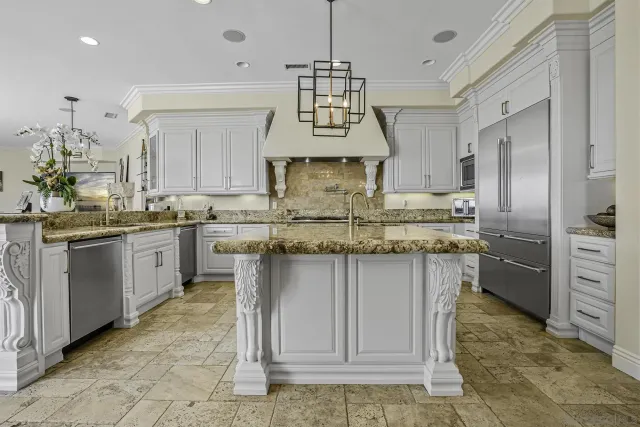 a living room with furniture cabinets and a window