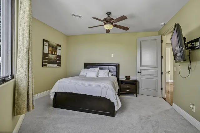 a view of a room with large windows