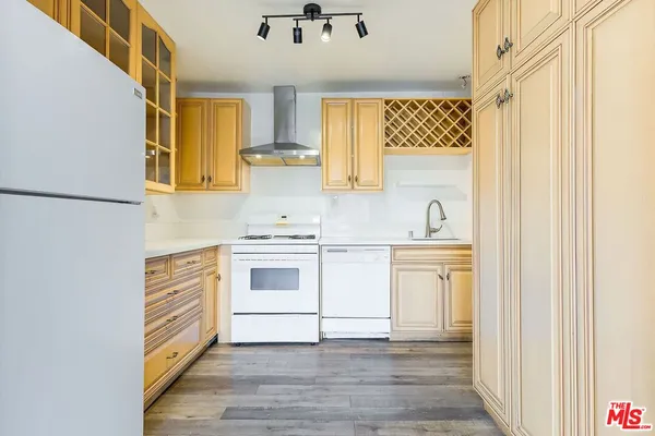a view of a storage & utility room with a sink