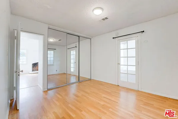 a view of an empty room and window