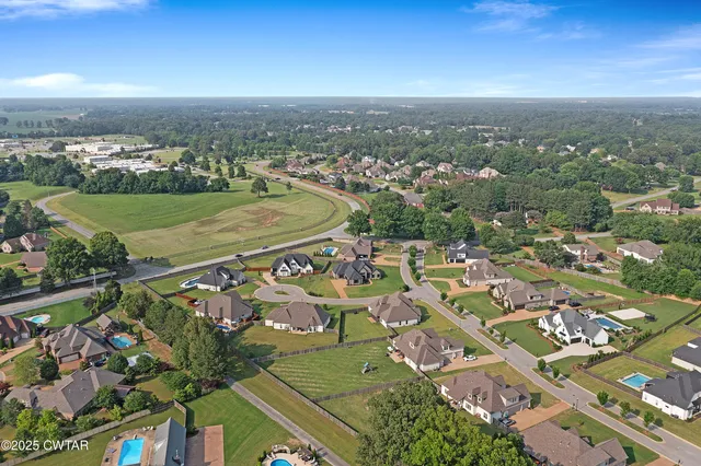 an aerial view of a highlighted house