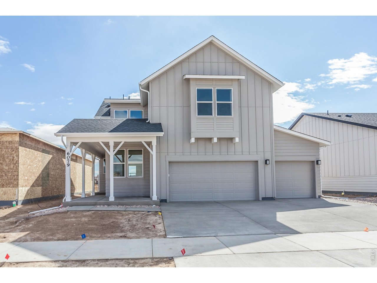 6079 Red Barn Road Timnath, CO 80547 - Photo 1 of 44 Front of house with covered front patio
