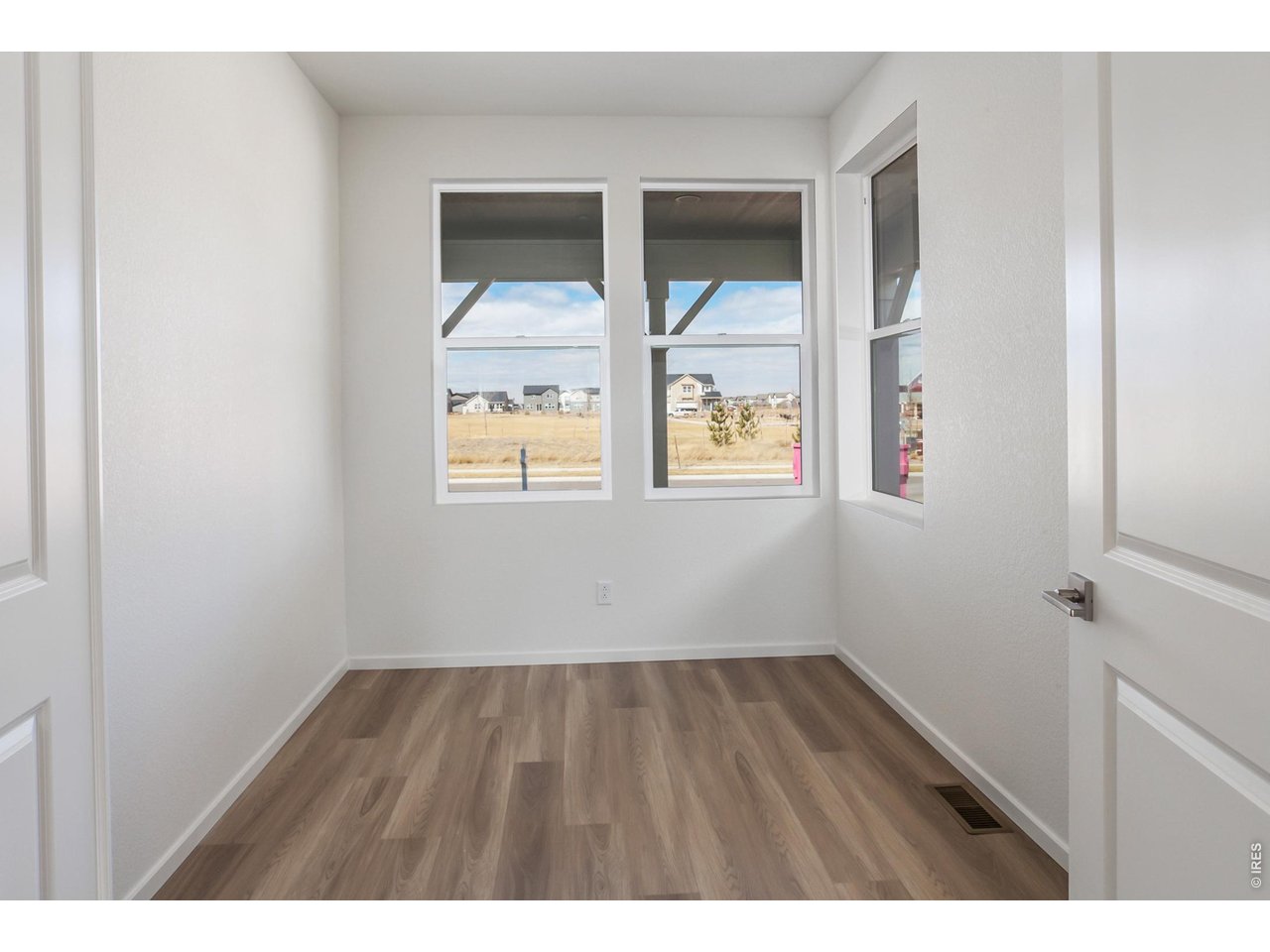 6079 Red Barn Road Timnath, CO 80547 - Photo 3 of 44 Main level office / flex room