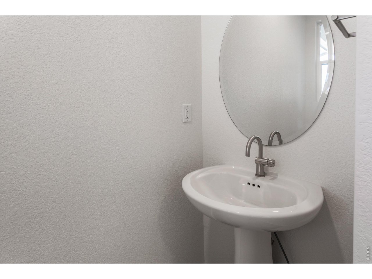 6079 Red Barn Road Timnath, CO 80547 - Photo 4 of 44 Main level powder bath