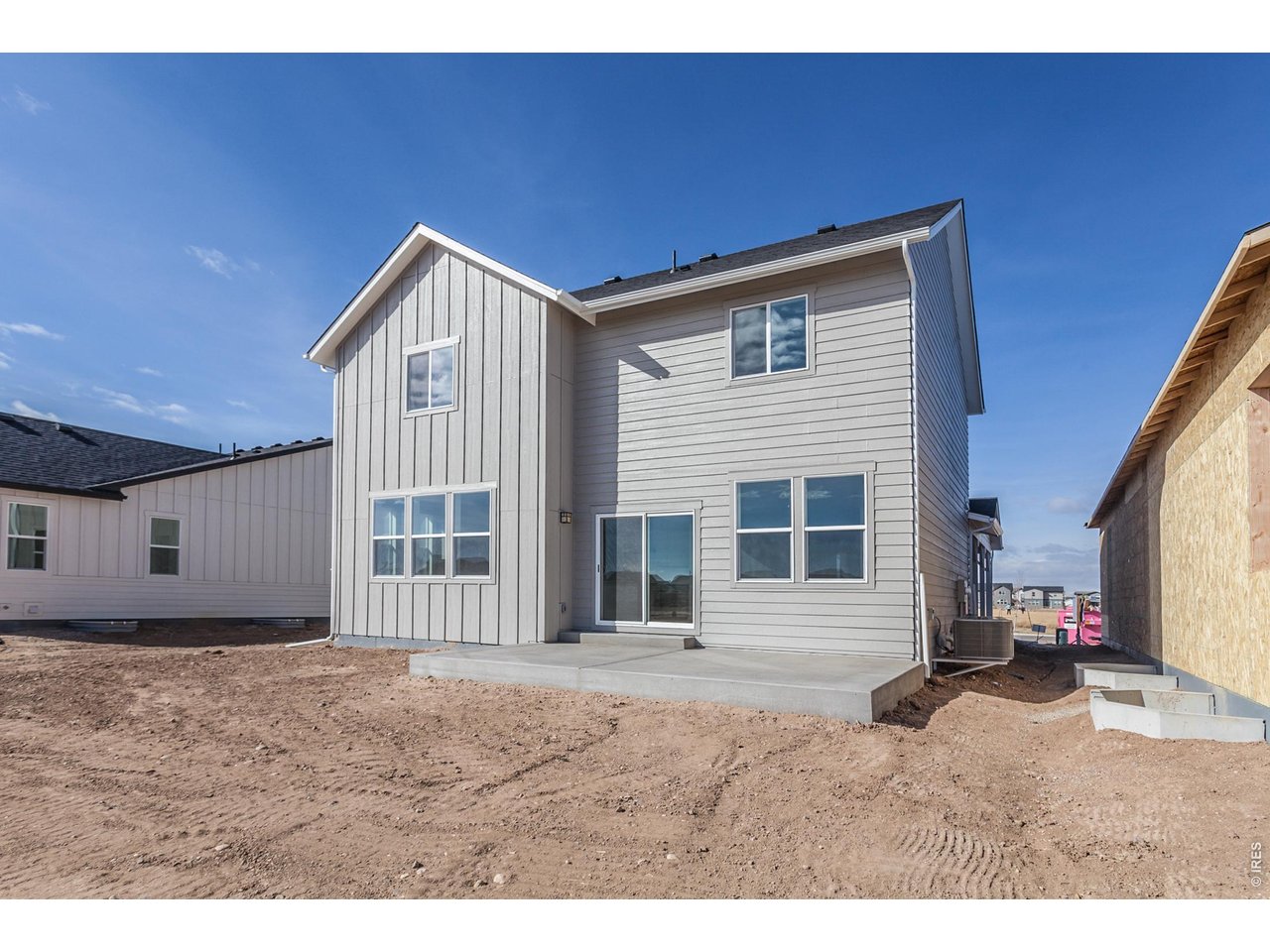 6079 Red Barn Road Timnath, CO 80547 - Photo 42 of 44 Back of home with extended patio