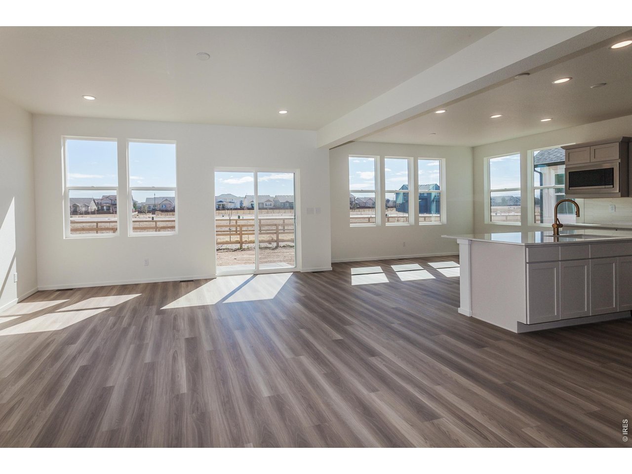 6079 Red Barn Road Timnath, CO 80547 - Photo 5 of 44 Bright and open living area