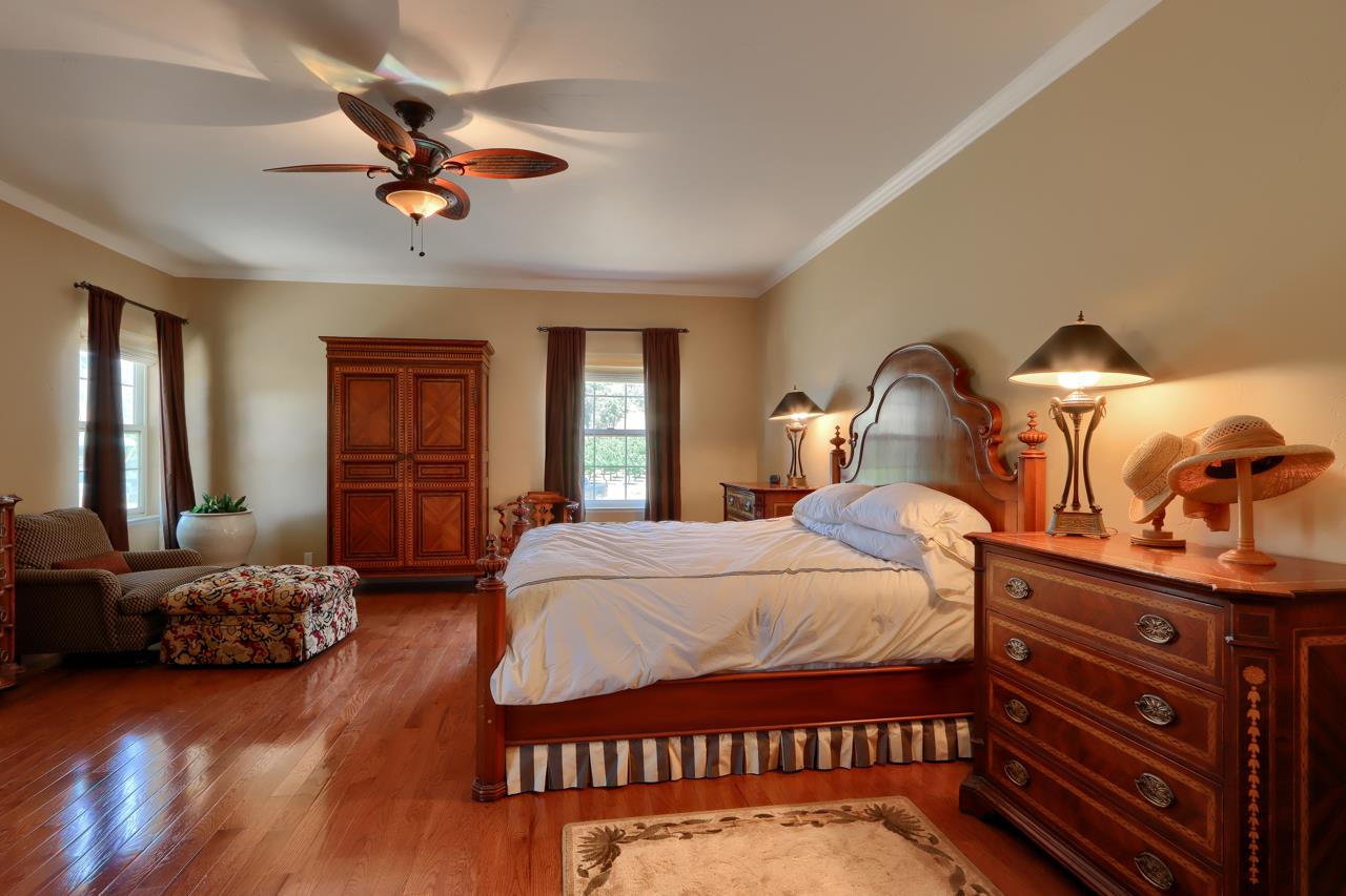 7551 Hunters Valley Road Mariposa, CA 95338 - Photo 33 of 78 a bedroom with a bed and window