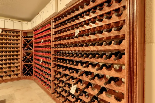 a view of a lush green hillside and a building