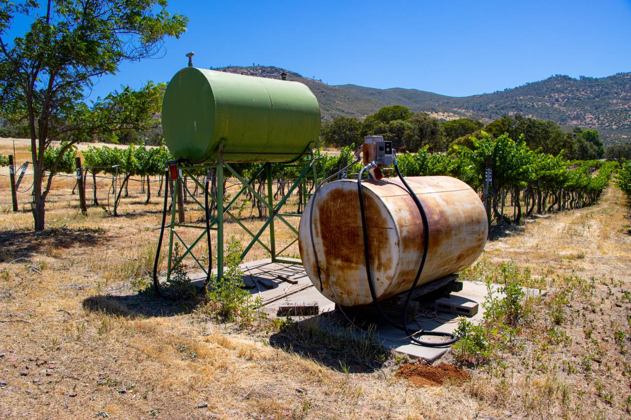 7551 Hunters Valley Road Mariposa, CA 95338 - Photo 58 of 78 a view of a chairs under an umbrella