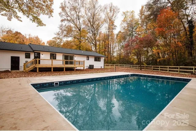 a view of a swimming pool with a patio