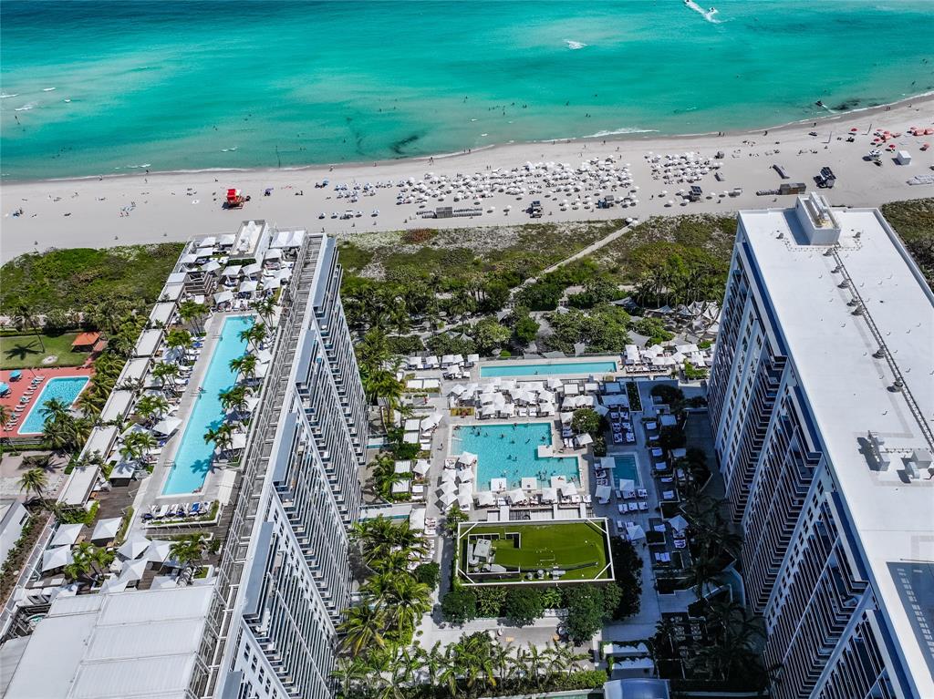 2301 Collins Avenue, Unit 1015 Miami Beach, FL 33139 - Photo 13 of 15 a view of building and yard