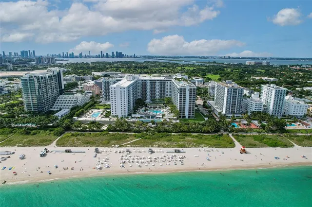 a dining room with a window and a chair