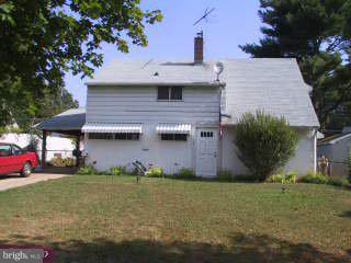 10 Grapevine Road Levittown, PA 19057 - Photo 1 of 1 a view of a house with a yard