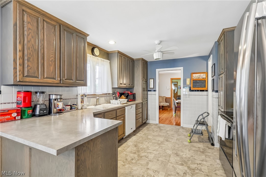 836 Jacoby Road Akron, OH 44333 - Photo 11 of 45 Kitchen with sink, ceiling light / fan, cabinets and all appliances