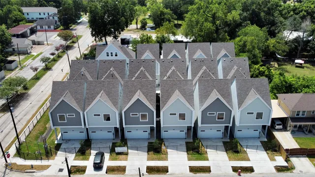 an aerial view of a house with a garden
