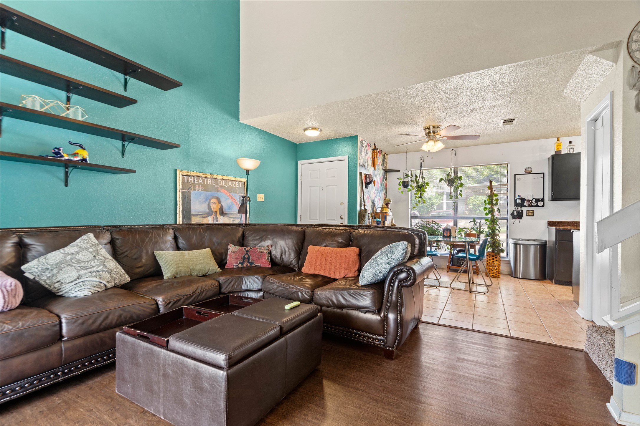 2018 West Rundberg Lane, Unit 4B Austin, TX 78758 - Photo 7 of 28 a living room with furniture and wooden floor