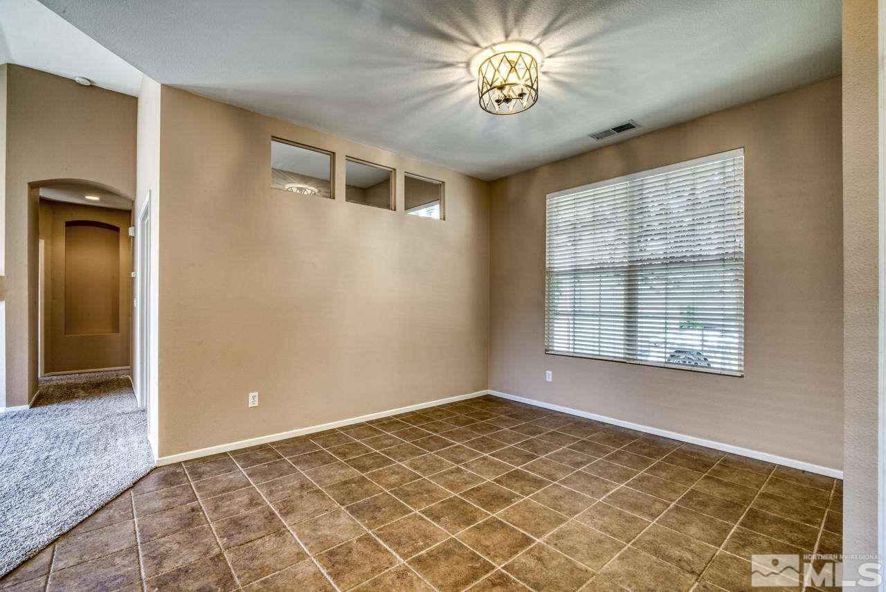 9683 Truckee Meadows Place Reno, NV 89521 - Photo 14 of 33 a view of an empty room with a window