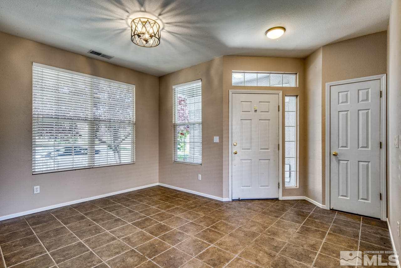 9683 Truckee Meadows Place Reno, NV 89521 - Photo 15 of 33 an empty room with windows and closet