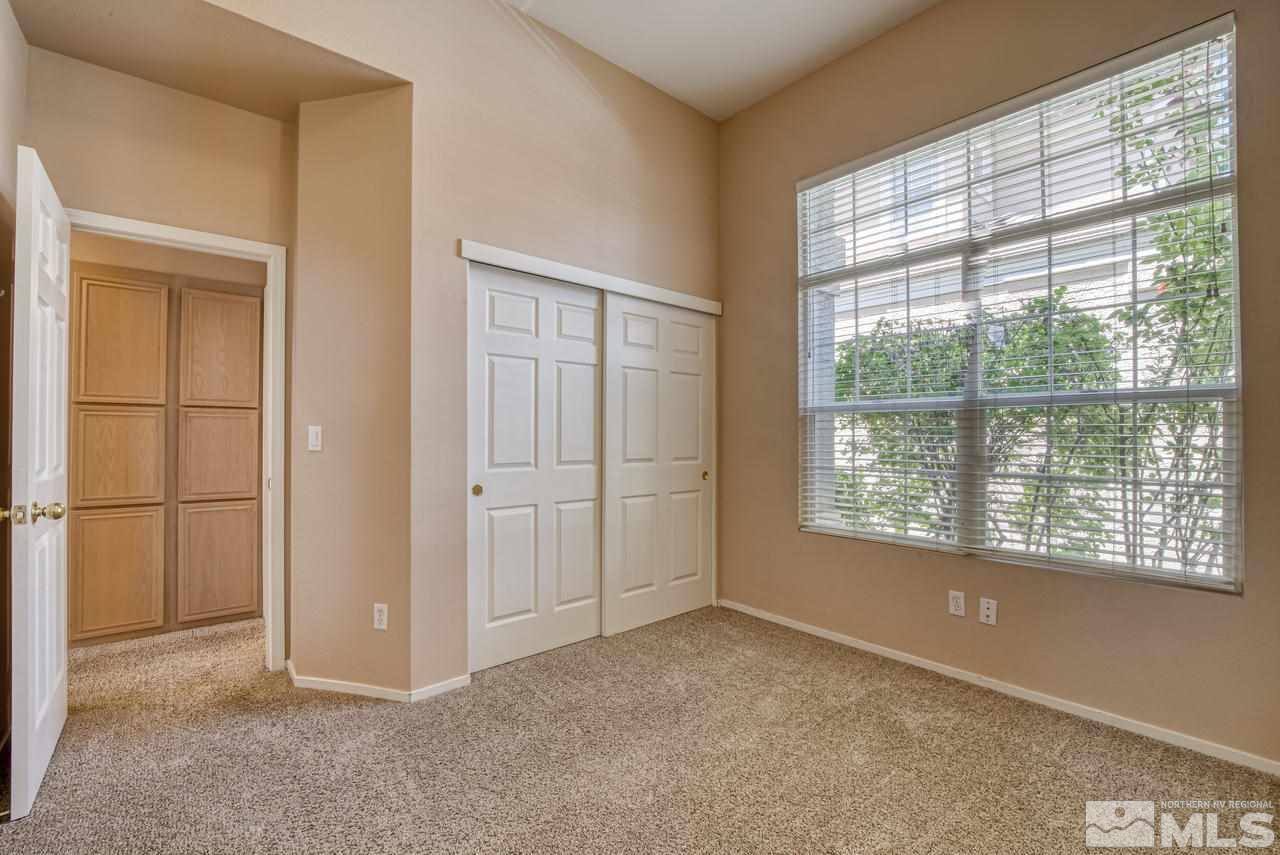 9683 Truckee Meadows Place Reno, NV 89521 - Photo 23 of 33 a view of an empty room with a window
