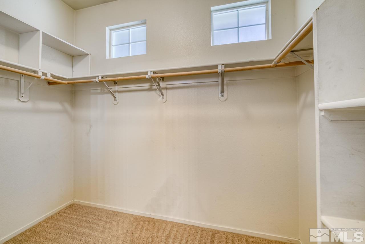 9683 Truckee Meadows Place Reno, NV 89521 - Photo 29 of 33 a view of a room with racks on the wall