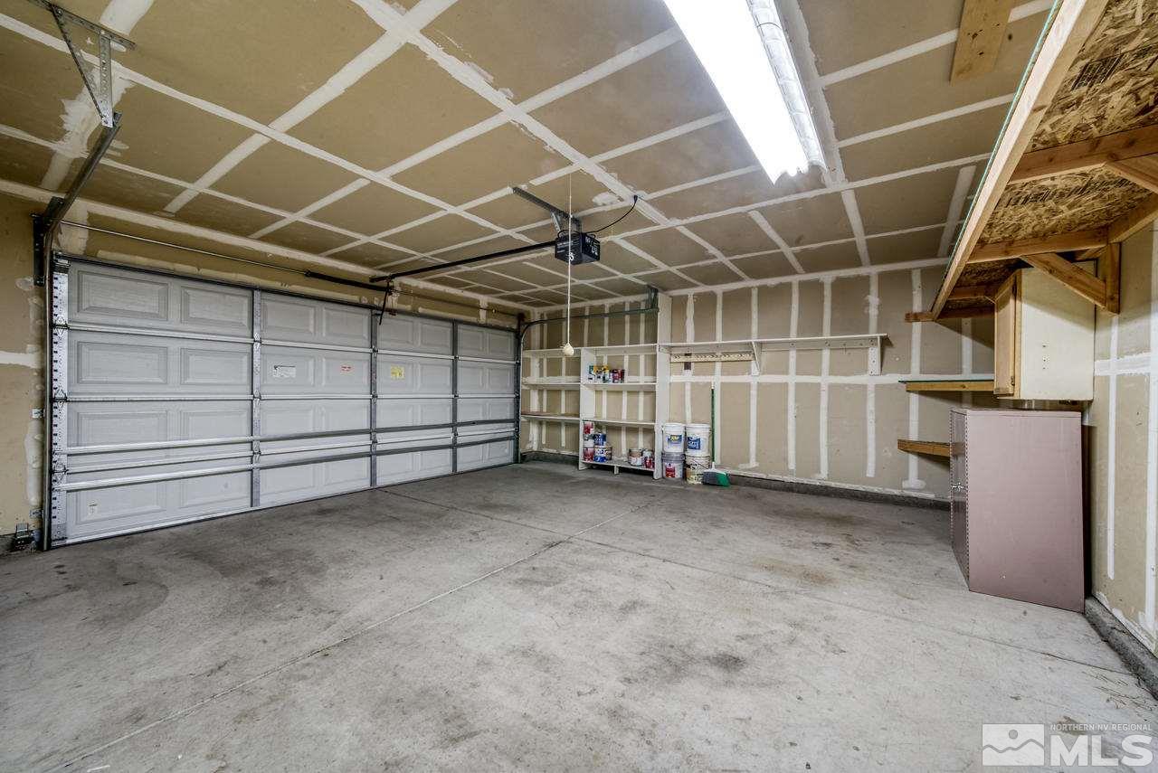 9683 Truckee Meadows Place Reno, NV 89521 - Photo 10 of 33 a view of a garage