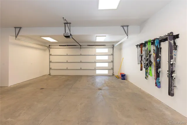a view of a garage with stairs