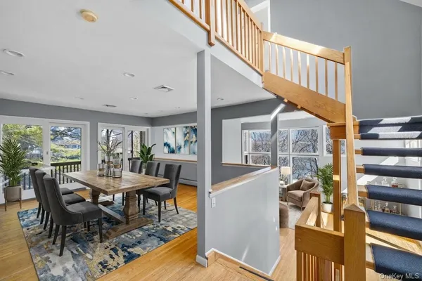 a view of a dining room with furniture window and outside view