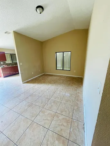 a view of a livingroom with a staircase