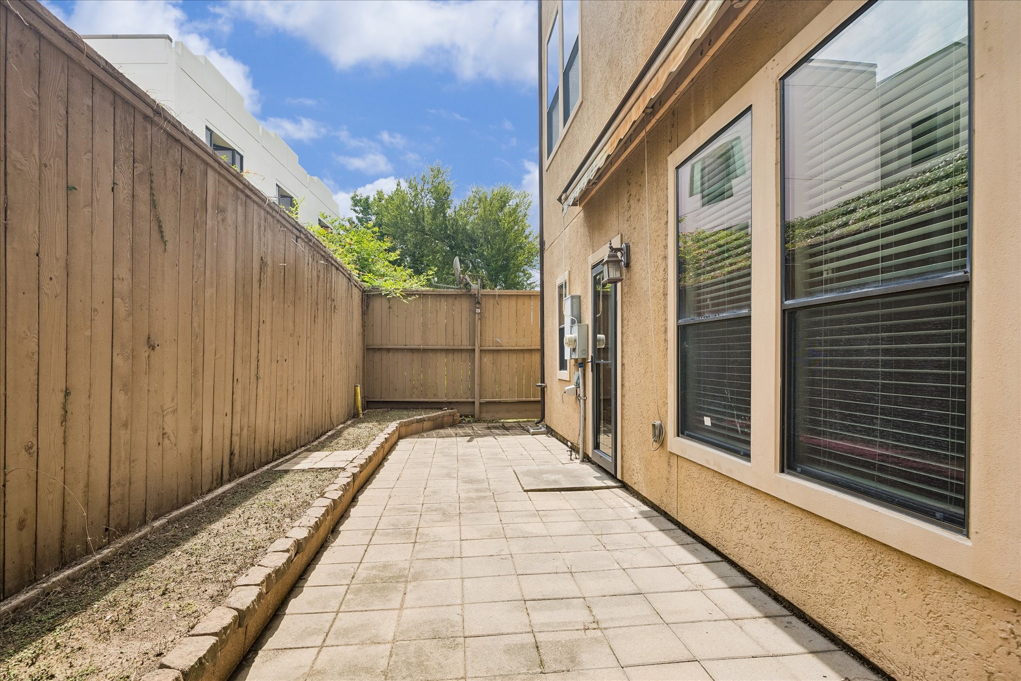 3002 Soutine Street Houston, TX 77021 - Photo 17 of 22 Enclosed wrap around back patio with retractable awning!