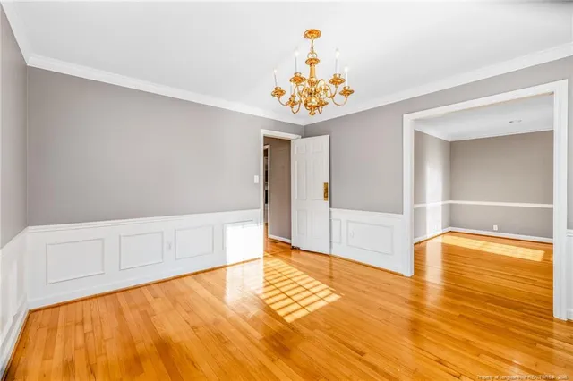 a view of an empty room with a bathroom