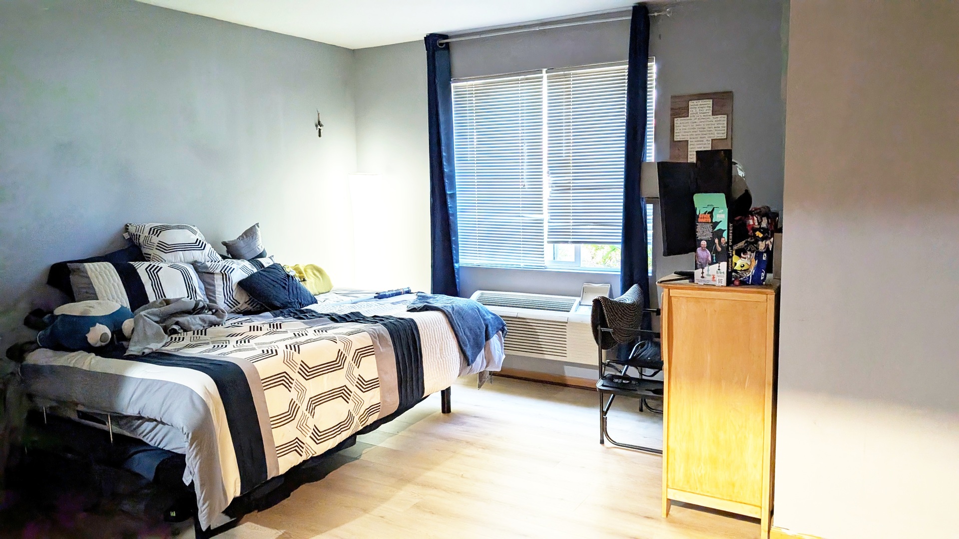 1444 McClure Road, Unit 1444 Aurora, IL 60505 - Photo 5 of 8 a bedroom with a bed and a window