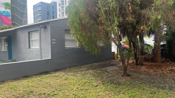 a backyard of a house with lots of green space