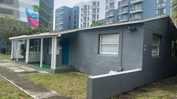 a view of balcony with furniture