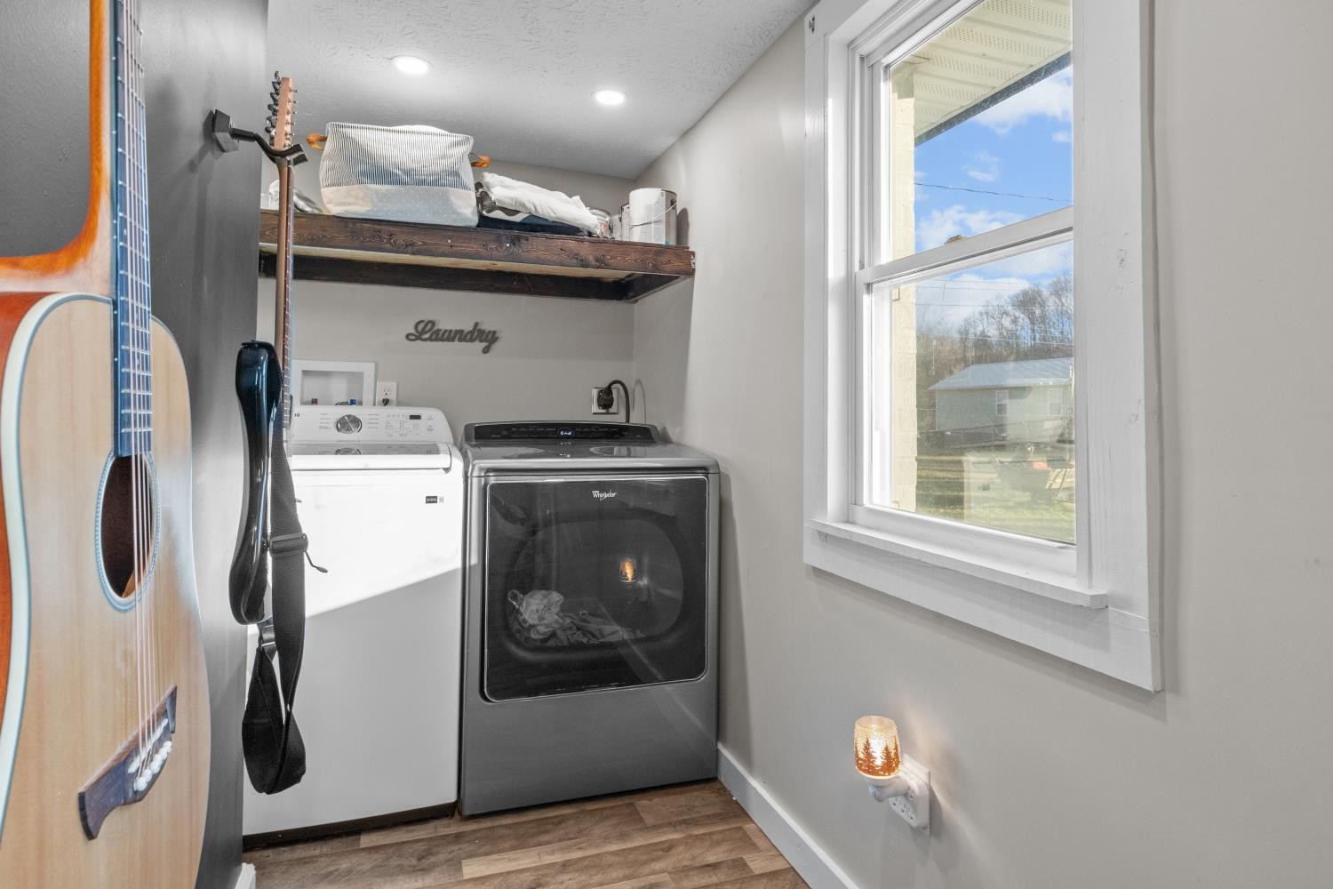 206 Joe Street Waverly, TN 37185 - Photo 16 of 28 a view of a storage & utility room with washer and dryer