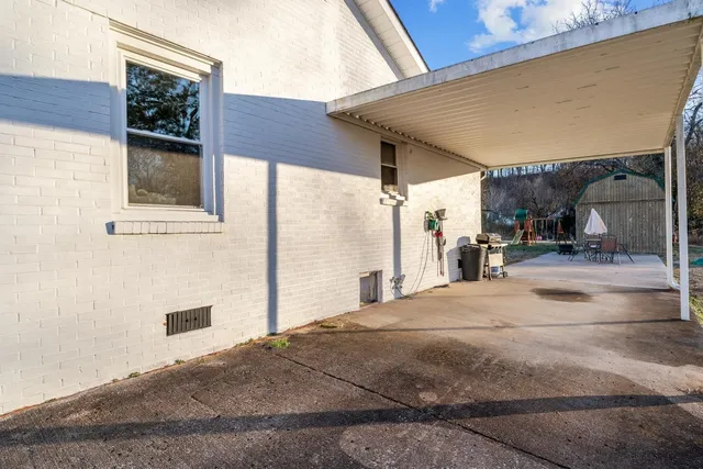 a view of a building with a street