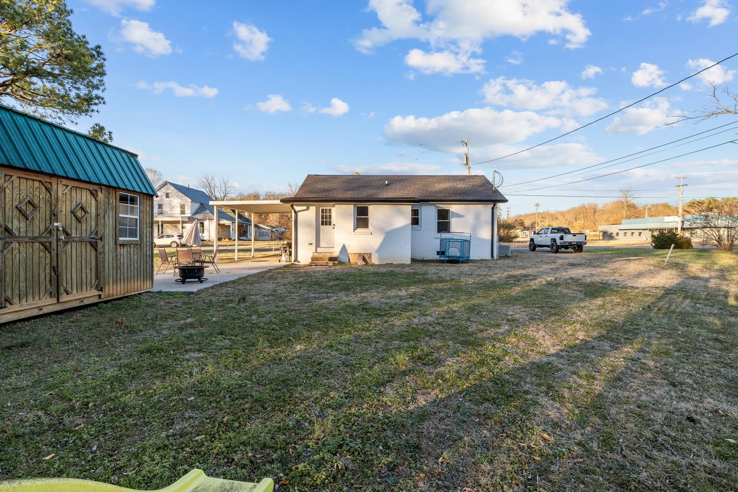206 Joe Street Waverly, TN 37185 - Photo 26 of 28 a front view of a house with a yard