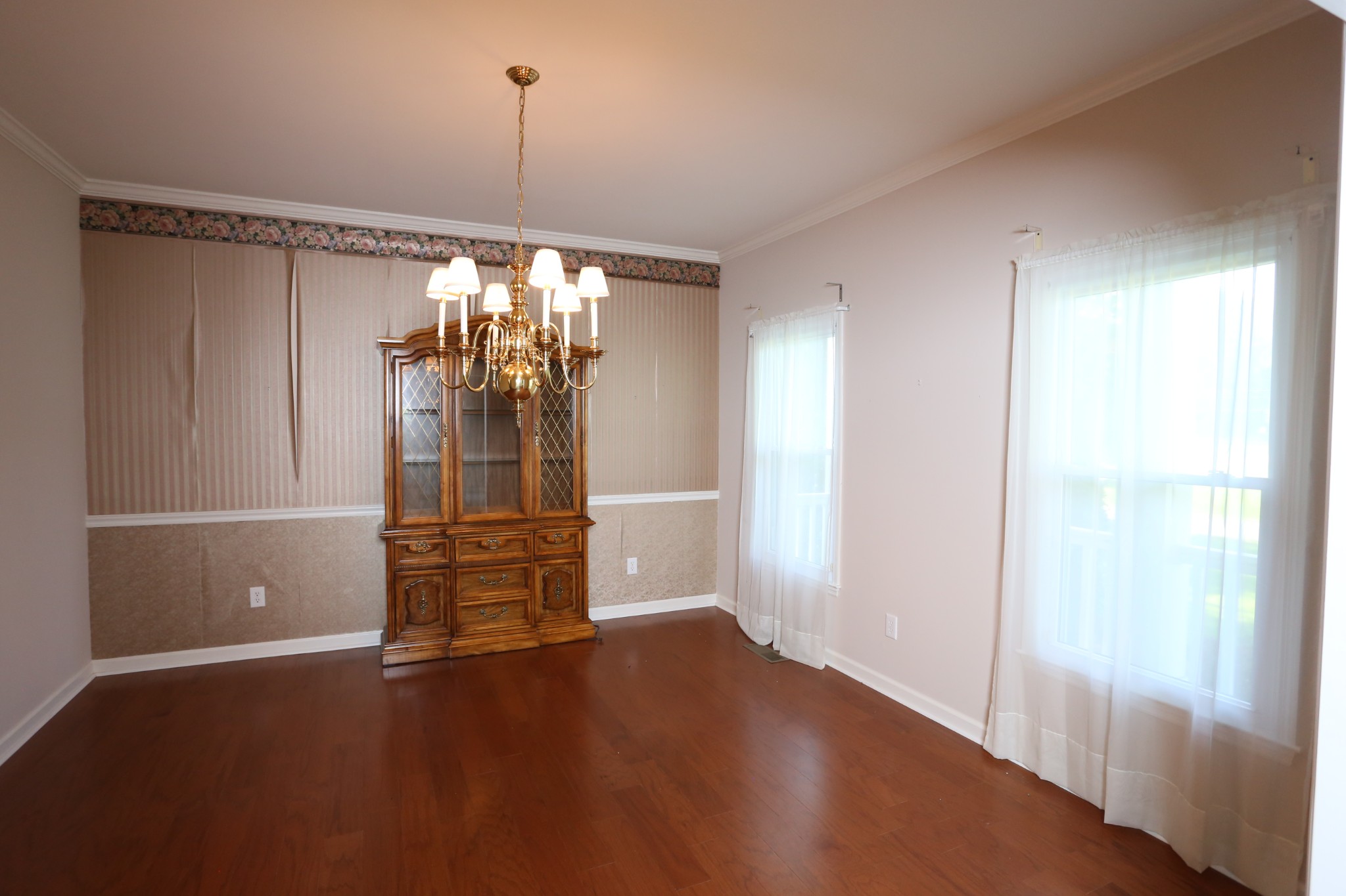 4026 Windland Drive Springfield, TN 37172 - Photo 11 of 48 en empty room with wooden floor and window