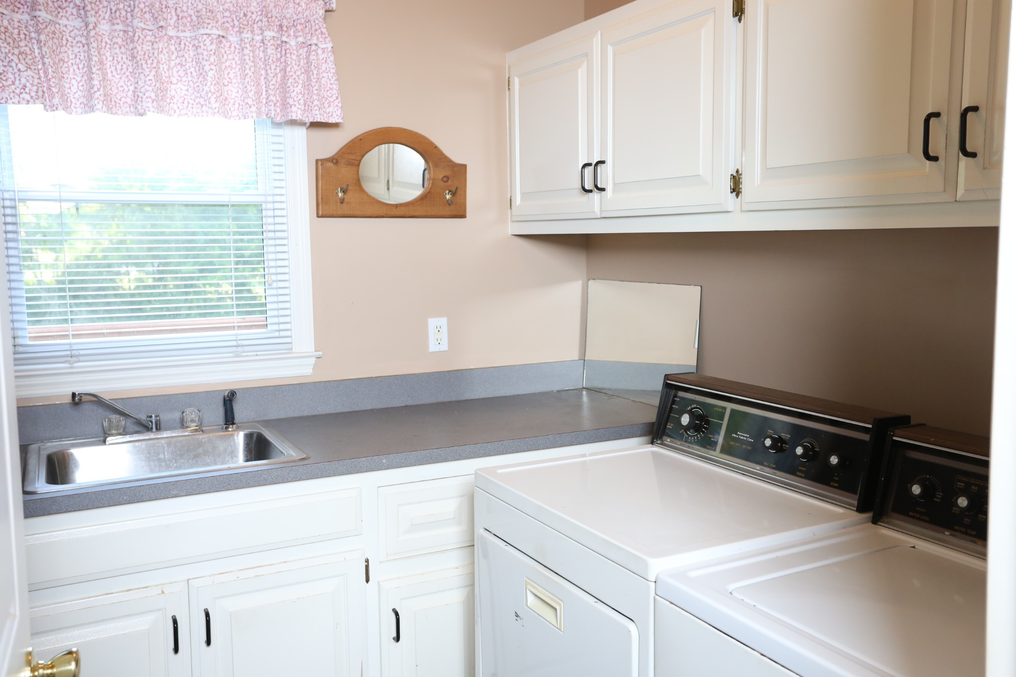 4026 Windland Drive Springfield, TN 37172 - Photo 18 of 48 a kitchen with a sink cabinets and window