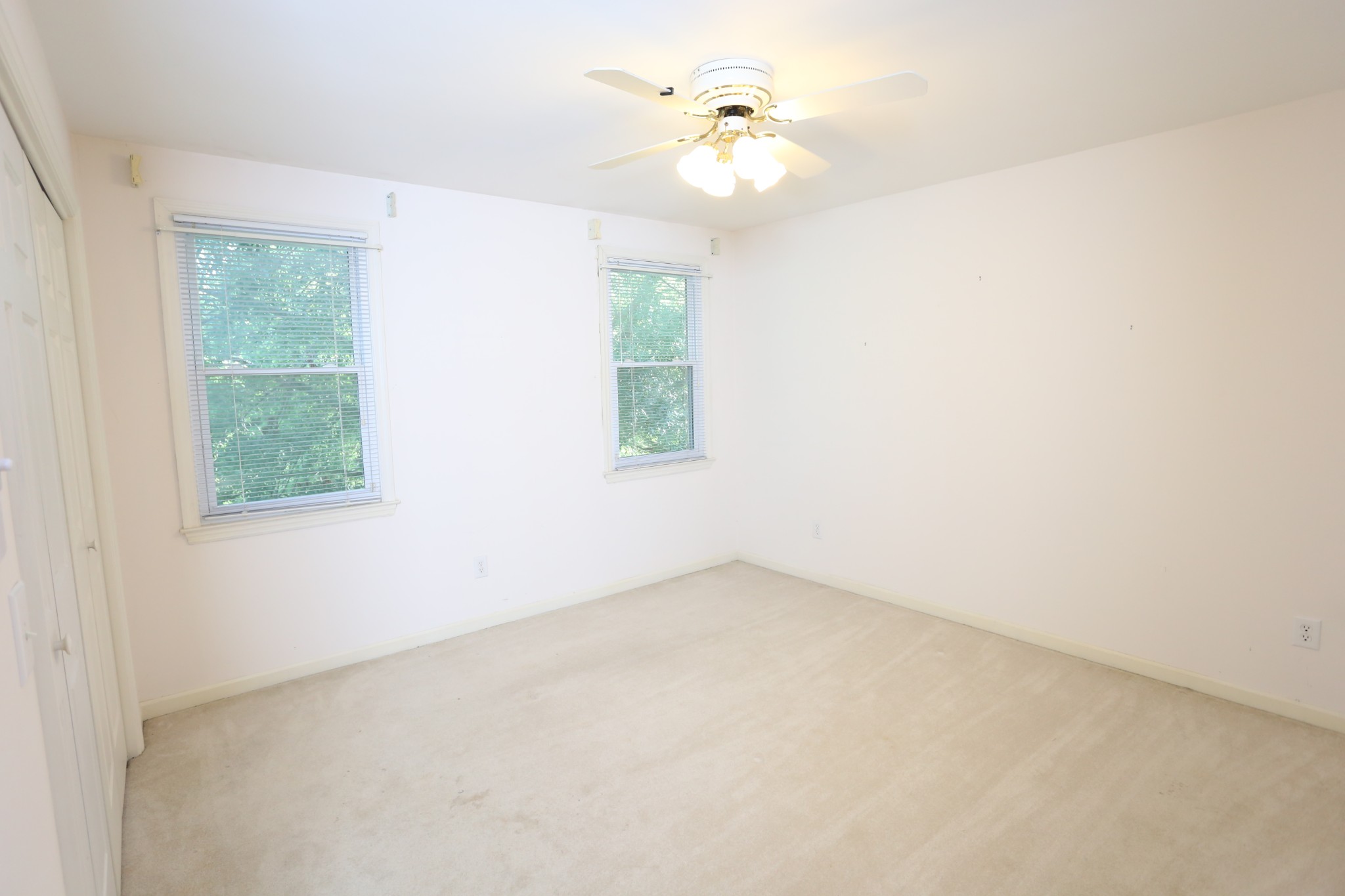 4026 Windland Drive Springfield, TN 37172 - Photo 36 of 48 an empty room with a window and a fan