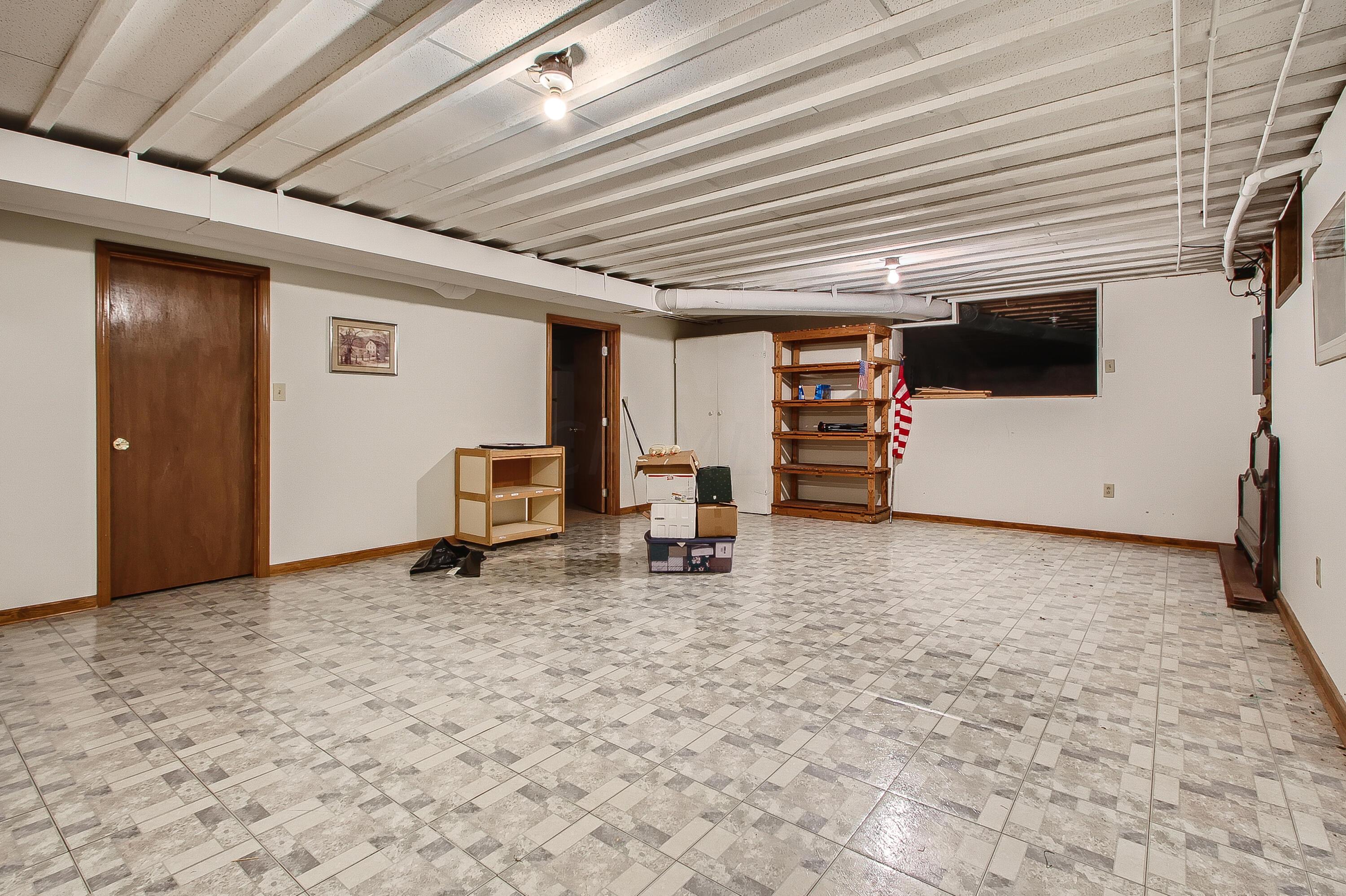 5884 Refugee Road Baltimore, OH 43105 - Photo 23 of 28 FINISHED LOWER LEVEL