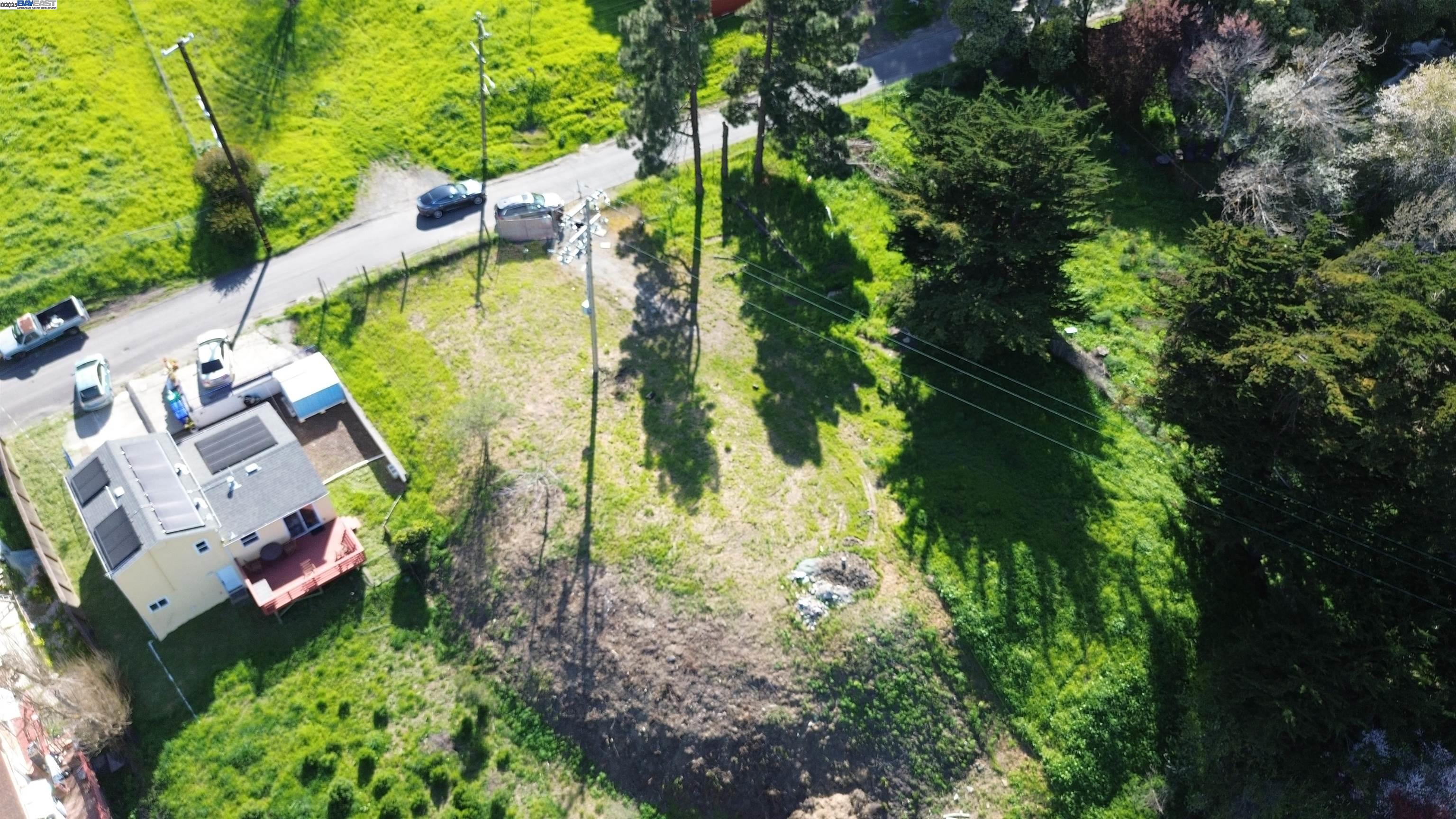 3944 La Cima Road El Sobrante, CA 94803 - Photo 22 of 35 an aerial view of a house with swimming pool and garden