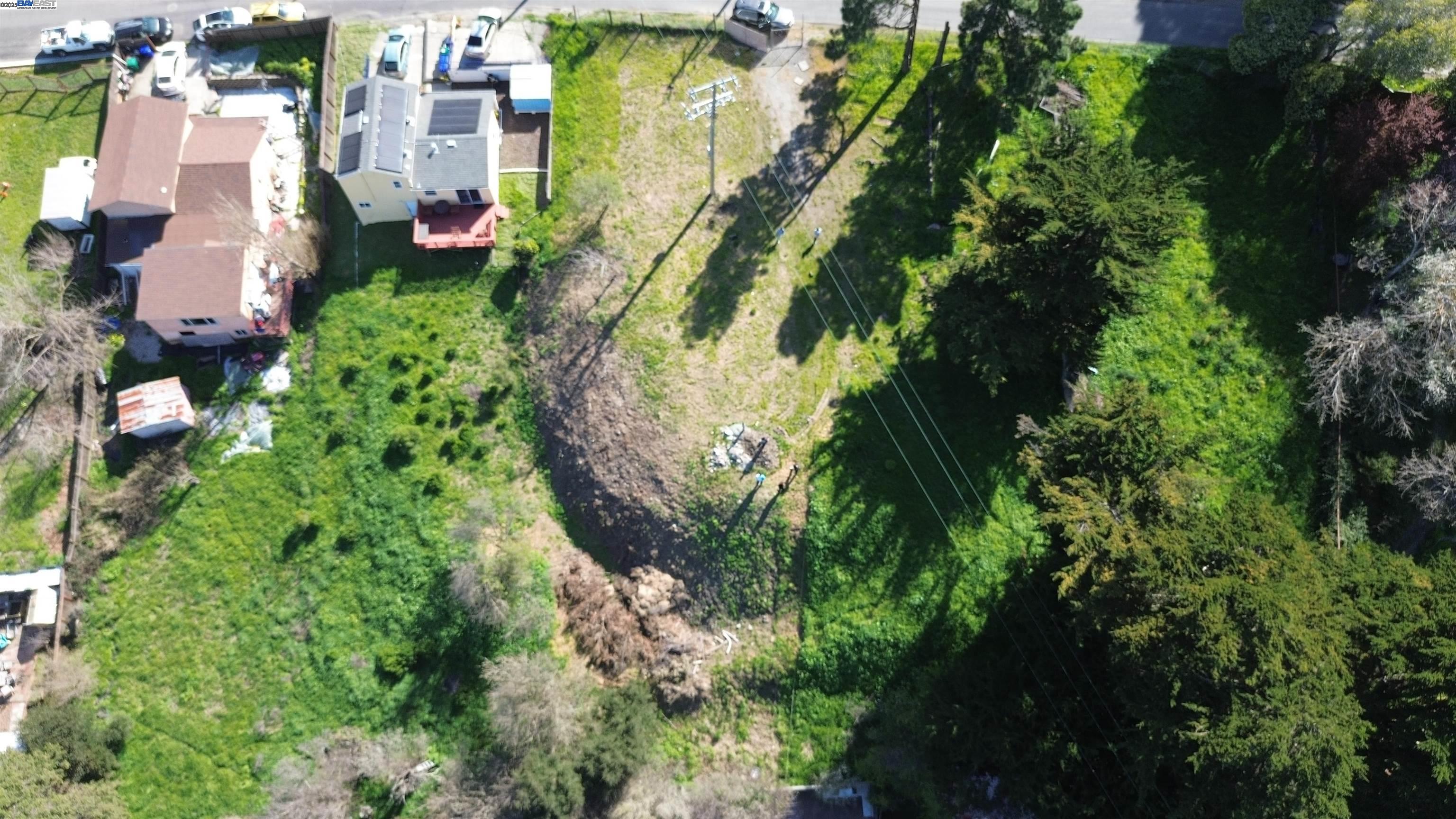 3944 La Cima Road El Sobrante, CA 94803 - Photo 25 of 35 an aerial view of residential houses with outdoor space and trees