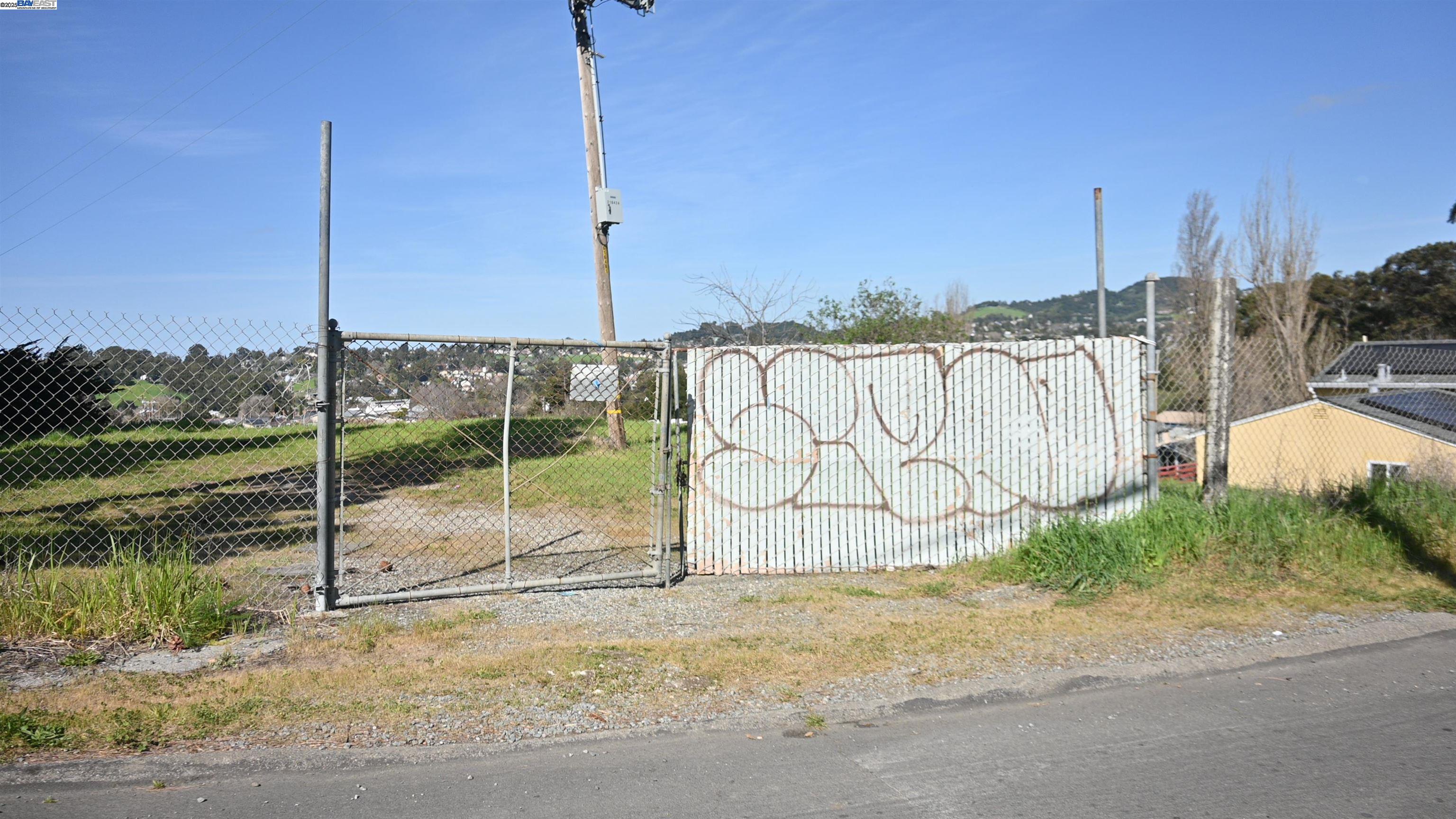 3944 La Cima Road El Sobrante, CA 94803 - Photo 35 of 35 a sign board with yard and lake view