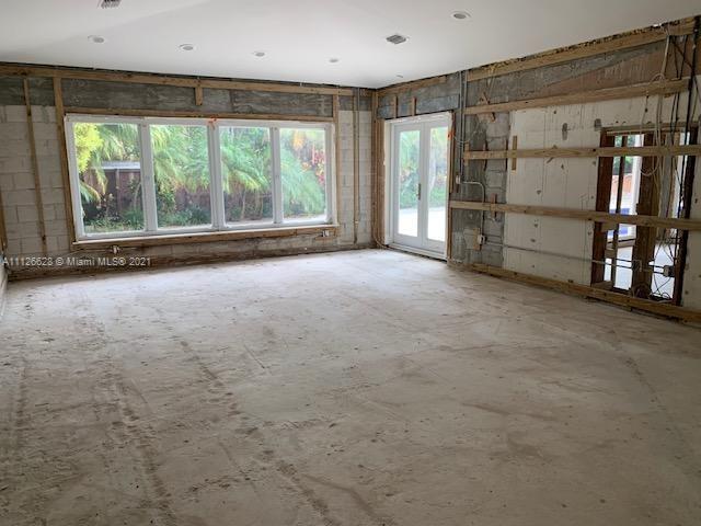 323 Caribbean Road Key Biscayne, FL 33149 - Photo 5 of 20 en empty room with windows