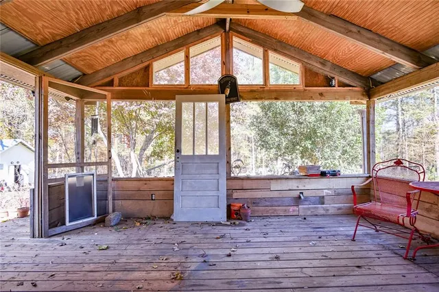 a living room filled with furniture and a table