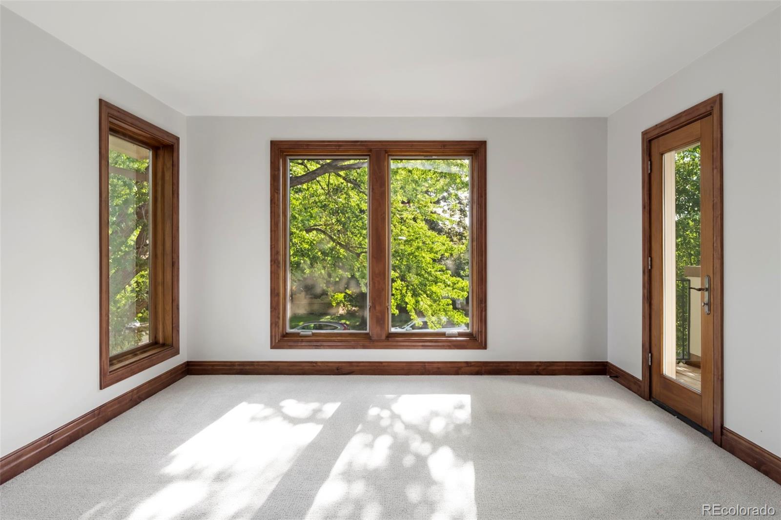 1026 South Cook Street Denver, CO 80209 - Photo 22 of 34 a view of an empty room with window and closet area